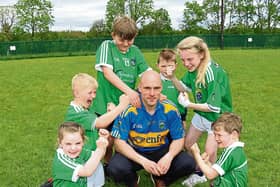 Pupils show their support for Limerick Hurlers: Lila O' Sullivan, Sam Hogan, Cormac Ryan Rian Hurley, Tara Madigan, and Gearoid O'Callaghan with principal Richie Ryan | Picture: Michael Cowhey