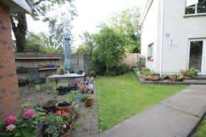 The house benefits from gas fired central heating, PVC double glazed windows, PVC fascia/soffits and red brick/dashed exterior. Outside the property features a detached garage and good-sized gardens in lawn with PVC fascia/soffits and a red brick/dashed exterior.