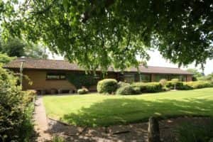 Outside the property is approached by a recessed entrance via a sweeping tree-lined tarmacadam avenue with paddocks on both sides, a double garage with a workshop, fuel store, boiler house, mains water, oil fired central heating, PVC fascias and soffits. The property benefits from 12 acres of quality land which is perfect for grazing horses and includes proximity to the River Liffey.