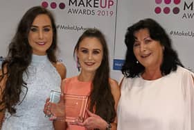 A delighted Andrea with her sister Abigail and mother Eileen