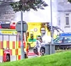 Later photos show the charred roof of an ambulance (below).