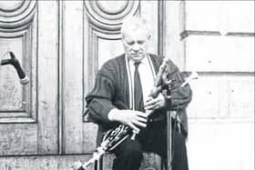 Famed Longford piper, the late Peter Carberry, pictured performing at College Green, Dublin in 1988