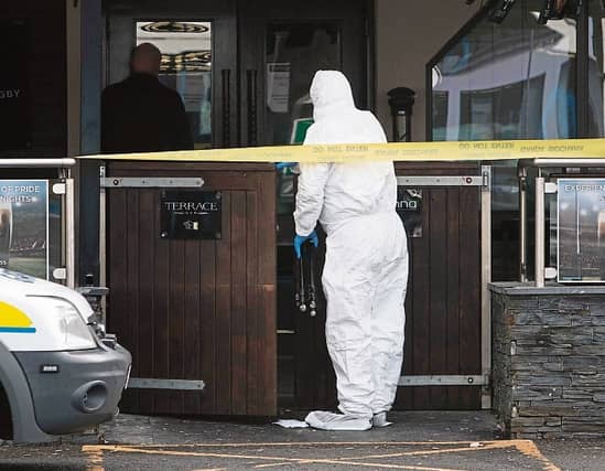 Gardai at the scene of last year's stabbing | PICTURE: Press 22