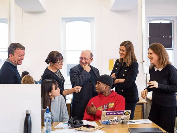 Mary Harris, far right, with students May Hooi and Farouk Alao, centre and from left, Eamon Spellman, Head of Graphics LSAD, Clodagh Twomey, LSAD, David Glass, M&C Saatchi and Laura Ryan