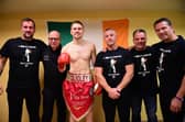 Jason Quigley . . . in action against Hernandez
