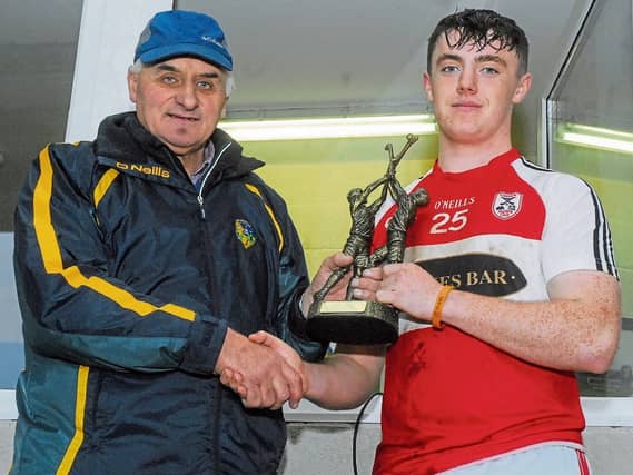 Stephen Goldrick is presented with the Man of the match award by Martin Cunniffe. Photo by Willie Donnellan