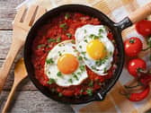 Huevos rancheros  ‘rancher's eggs’ is a   traditional large mid-morning fare on rural Mexican farms
