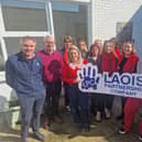Staff of Laois Partnership Company at the unveiling of a special mural created by local migrant communities.
