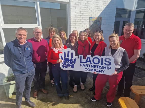 Staff of Laois Partnership Company at the unveiling of a special mural created by local migrant communities.