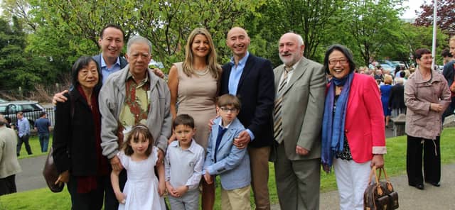 Pat McNamara, second from right on back row, with family members.