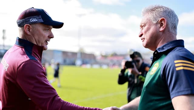 Michael Donoghue and Johnny Kelly shake hands