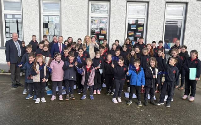 Pictured: Students at Scoil Fionntáin Naofa, Shanahoe with MEP Cynthia Ní Mhurchú, Sean Fleming TD and Cllr John Joe Fennelly