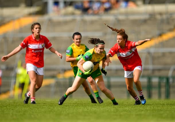 Geraldine McLaughlin of Donegal in action against Emma Spillane of Cork PICTURE: Eóin Noonan/Sportsfile
