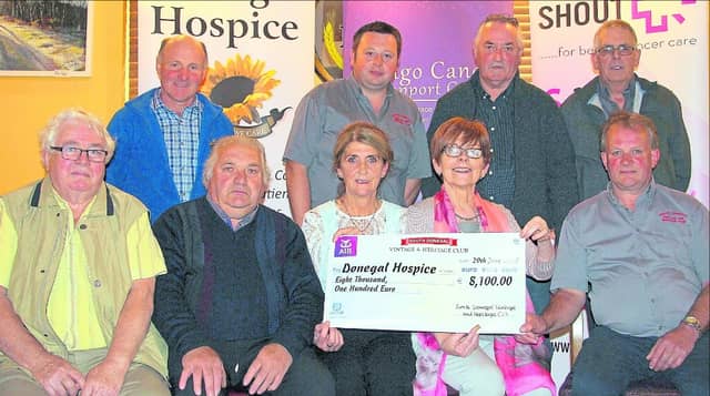 South Donegal Vintage and Heritage club members present cheque to Annette Cunningham , Donegal Hospice PRO.