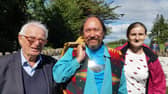 Anthony Ivors of The Commons, Walk Leader Waylon White Deer, and Veronica Ivors