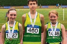 North Leitrim AC's walking medalists Niamh Carolan (U15 gold), Darragh Mitchell (U16 bronze) and Sara O'Beirne (U14 silver) pictured with their medals