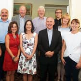 Gone but not forgotten: Organisers wish Fr Brendan Kyne, front, the very best in the future after his farewell Mass Picture: Brendan Gleeson