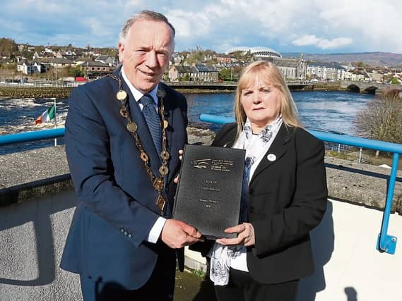 One of the sombre occasions of Mayor Keary’s office took place in March, when he handed over a packed book of condolences to Eileen, the mother of the late Dolores O’Riordan Picture: Adrian Butler