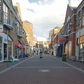 Late night shopping: Nigel’s pictures demonstrate the contrast between Cruise’s Street and the Crescent Shopping Centre, below, on Thursday around 7pm