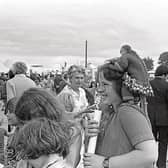 A girl with a monkey on her back at the Limerick Show in August 1978