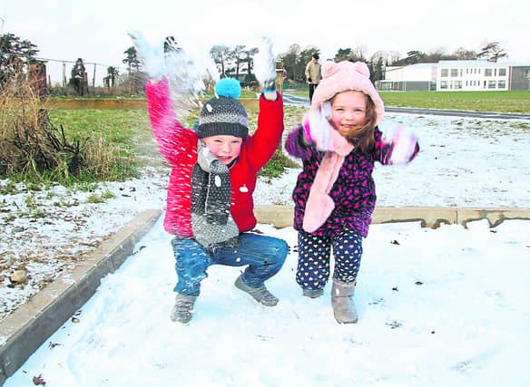 Joshua and Aliona Hannigan from Dooradoyle enjoying the snow Picture: Adrian Butler