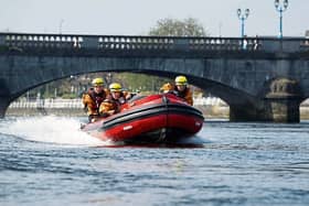 The woman was rescued from the water by Firefighter Swiftwater Rescue Technicians