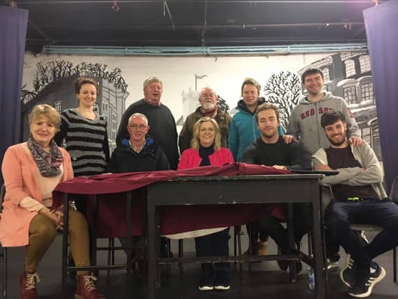 Trish O'Brien, Linda Tobin, front; Liam Carey, back; Anthony Flynn, front; Priscilla Whelan, back; Michael O' Donoghue (Director) front; Eoghan Ryan, back; Olivia Dunne, front; Cormac Maher, back