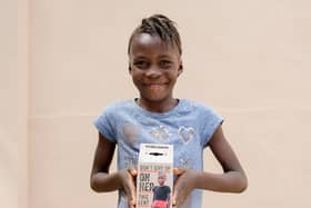 Kumba (7) from Sierra Leone appears on this Lent's Trocaire Box.
