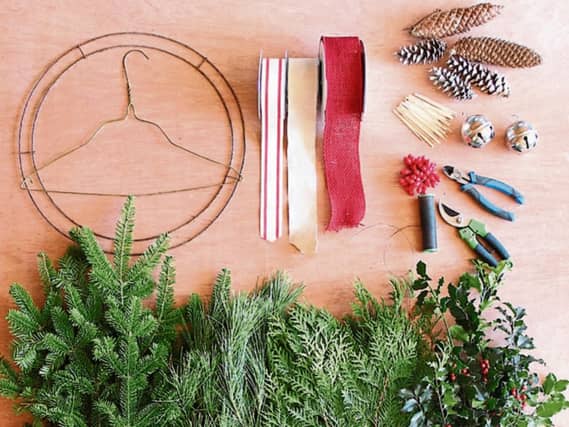With just a few bits from the gardening a homemade Christmas wreath is both easy and decorative