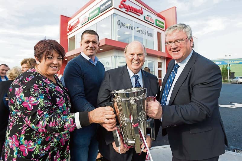 Una McDonagh, Alan Quinlan, former Minister for Finance Michael Noonan and Pat McDonagh with the Liam McCarthy Cup at the official opening of Supermacs Ballysimon  Picture: Eamon Ward