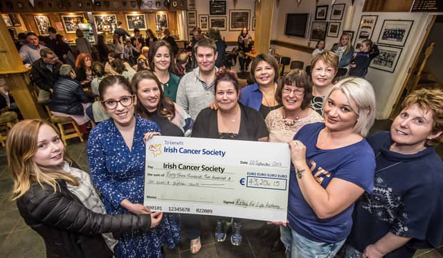 Emma Hayden and Mary Quinn, Irish Cancer Association received a cheque from Joanne Brennan and volunteers from Relay for Life at Kilkenny Rugby Club PICTURE: PAT MOORE