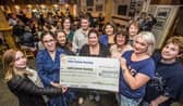 Emma Hayden and Mary Quinn, Irish Cancer Association received a cheque from Joanne Brennan and volunteers from Relay for Life at Kilkenny Rugby Club PICTURE: PAT MOORE