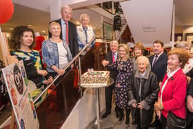 Vivian Good and Deirdre Shine, President of Kilkenny Chamber cut the cake to celebrate Good's 90th birthday