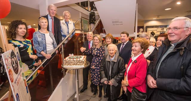Vivian Good and Deirdre Shine, President of Kilkenny Chamber cut the cake to celebrate Good's 90th birthday