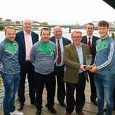 Dave O'Hora of media agency Southern (award sponsors) presenting the Limerick Person of the Month award to Tom Morrissey, captain of the Limerick U-21 hurling team