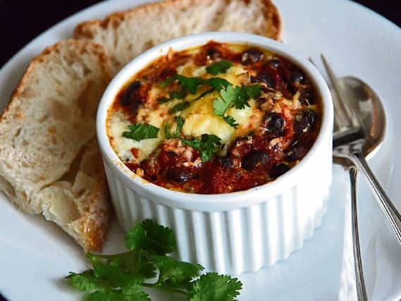 Here is to the next ten years! Gingergirl celebrates a decade of columns this week with her baked eggs with feta dish