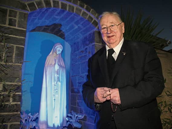 Des Fitzgerald stands by his Our Lady of Fatima shrine at his house in Greystones, off the Ennis Road Picture: Adrian Butler