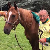 Tom MacGuinness beside his mount, Sasha D'Allais.