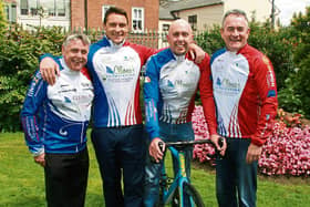 Pictured at the annual charity cycle launch were, Fergal Deegan, David Wallace, Glen Curtin, cyclist and Brendan Ring - Picture: Adrian Butler