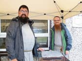 Firing up the barbecue: Fr Charles Reche, the longest serving Friar with Fr Bernardino, in Moyross Pictures: Michael Cowhey