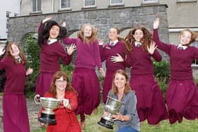 Laurel Hill Colaiste FCJ celebrate one of their earlier wins with principal Aedin Ni Bhriain and vice principal Norma Ni Luinneachain  Picture: Michael Cowhey