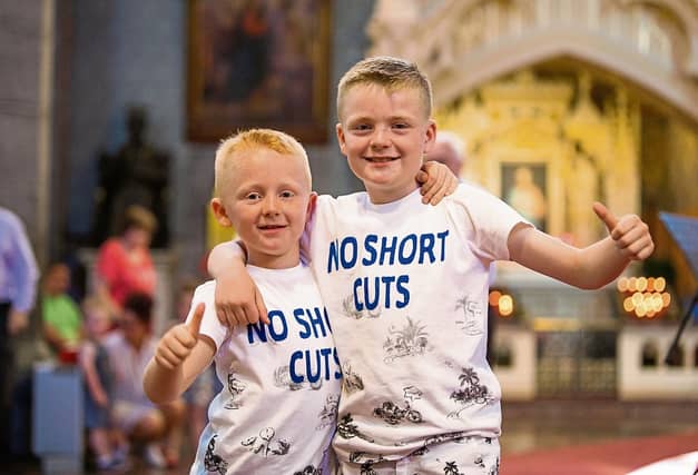 Fred and Paddy Sheridan at the Childrens Novena in the Redemptorist Church Picture: Oisin McHugh