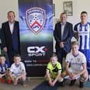 CX+Sport's Ciaran Herr (second from left) and David Minto (second from right) pictured with members of the Coleraine FC first-team and academy at the kit launch on Friday night