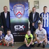 CX+Sport's Ciaran Herr (second from left) and David Minto (second from right) pictured with members of the Coleraine FC first-team and academy at the kit launch on Friday night