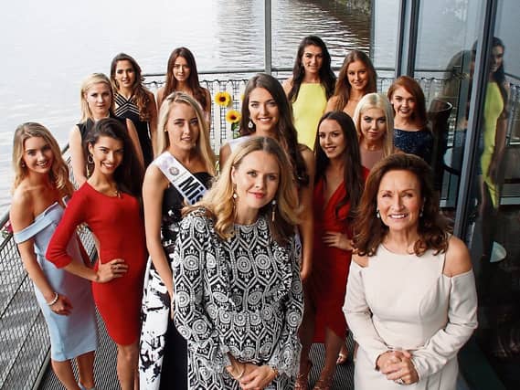 Celia Holman Lee pictured with her daughter-in-law Asta and the Miss Limerick contestants at the Clayton Hotel Picture: Cathal Frawley
