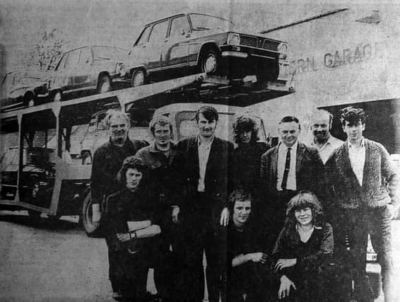 A nostalgic image of staff at the Northern Garage in Donegal town.