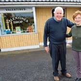 Jim and Abina Valentine pictured outside their shop and post office at Two Mile House shortly before the couple retired
