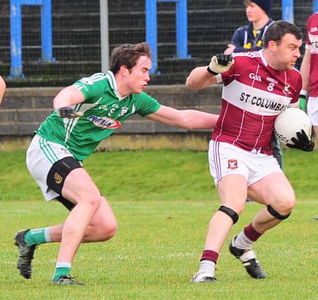 Ruairi McElligott on the ball for Mullinalaghta St Columba's in this tussle with Clonguish opponent Peter Hanley. Action from the Leader Cup Final at Glennon Brothers Pearse Park. Photo: D Gilmore