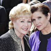 Carrie Fisher pictured with her mother Debbie Reynolds