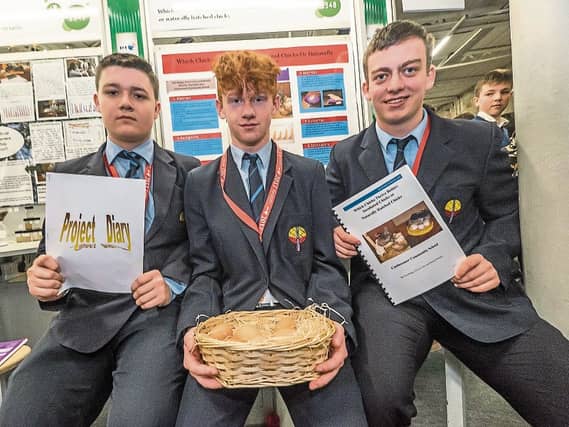 Daniel, Kevin and Tom asking the impossible question at the BT Young Scientist
